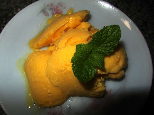Homemade Juju dhau and mango ice cream ready to be served
