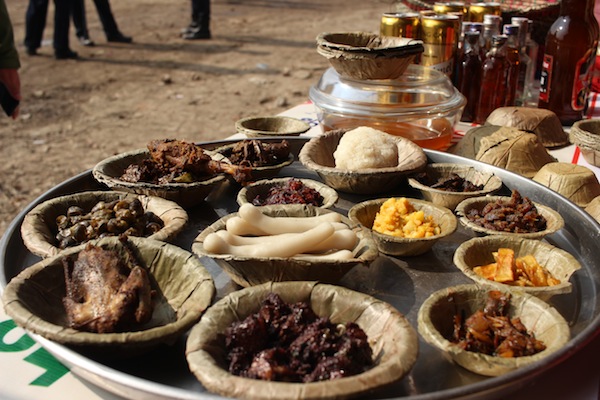 Set of Tharu dishes served on leaf plates (duna/tapari)