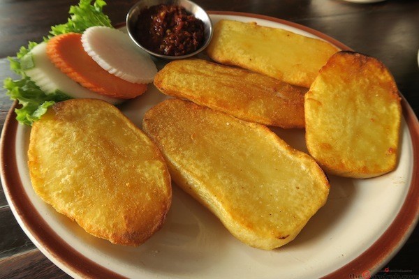 Aalu dameko- Mustang potatoes pan-fried in ghee and served with chili pickle