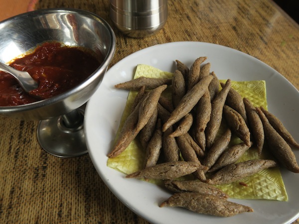 Kanchemba, a Thakali snack, is buckwheat fries fried in butter/ghee, and served with garlic-chilli sauce.