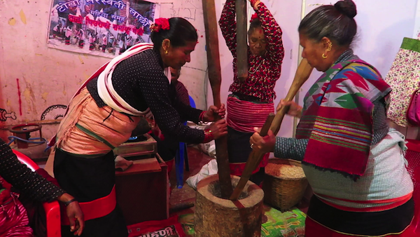 Making Baji or Chiura (Beaten Rice) in Traditional Way