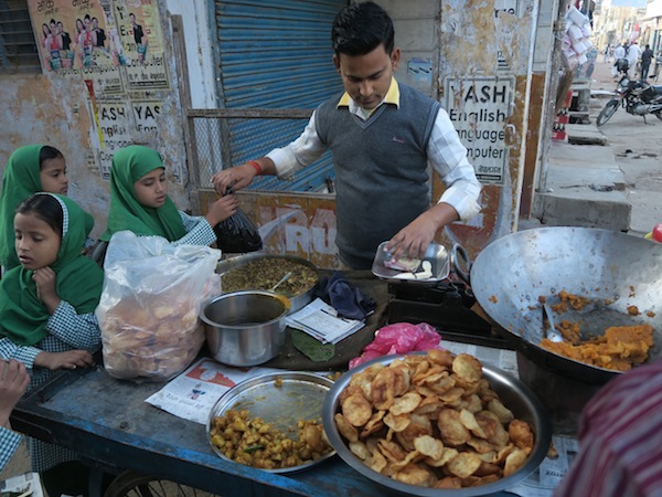 Selling chana puri and haluwa at Tribhuwan Chowk